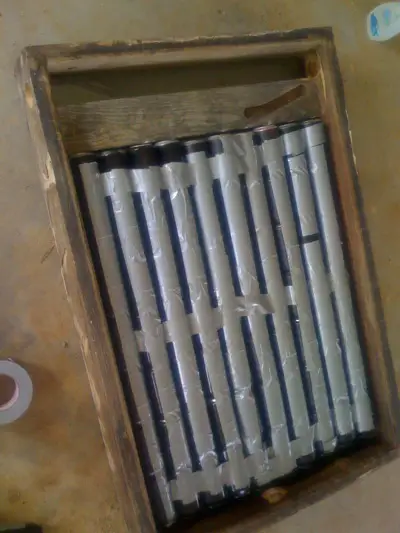 Solar Space Heater Made From Soda Cans & An Old Window. solar4 Solar Space Heater Made From Soda Cans & An Old Window.